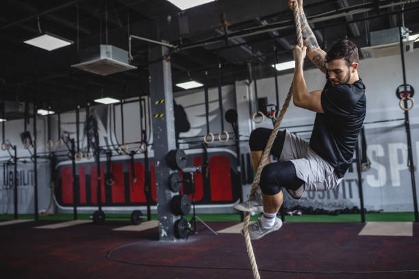 istock Strong athlete working on his endurance training at the gym 1149080797