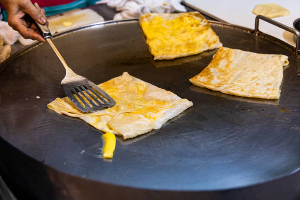istock Roti Making, Roti is fried on the pan. 1149081609