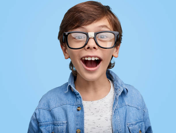 istock Excited smarty boy in eyeglasses 1149081618