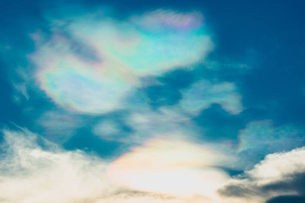istock Blue sky with rainbow and white clouds. Summer background 1149082039