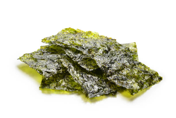 istock Nori seaweed isolated on white. 1149082045