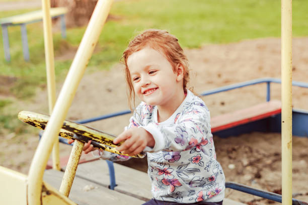 istock the child plays on the Playground 1149083250
