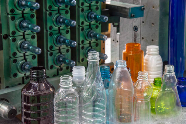 istock The plastic bottles and injection mold in background. 1149083596
