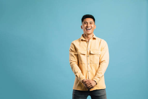 istock Portrait of a Young Man Laughing 1149085169