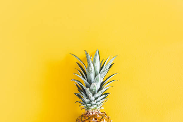 istock Summer composition. Pineapple on yellow background. Summer concept. Flat lay, top view 1149086620