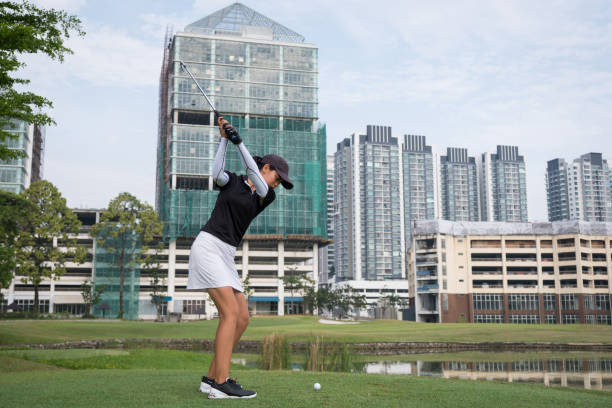 istock Professional golfer teeing off golf course fairway 1149086651