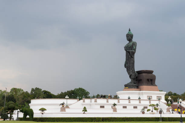 istock Large Buddha statue is standing on the concrete floor 1149086734