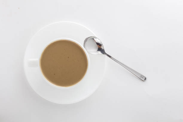 istock White cup of hot coffee and tea spoon.. 1149088049