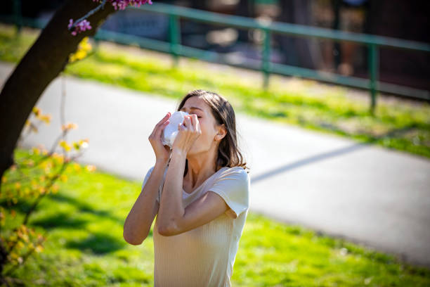 istock Attractive Woman Outdoors is Having Allergy 1149089500