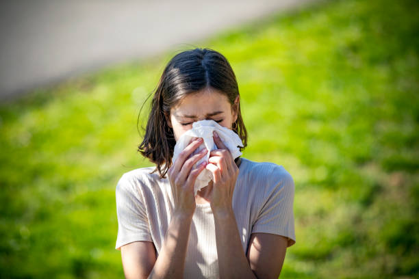 istock Attractive Woman Outdoors is Having Allergy 1149089590