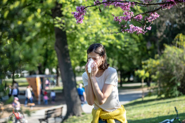 istock Attractive Woman Outdoors is Having Allergy 1149089762