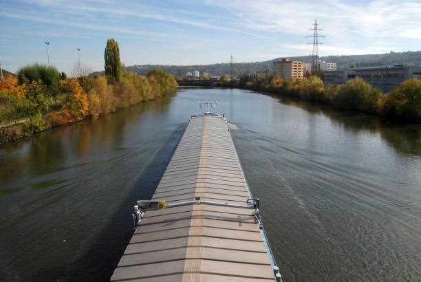 covered cargo ship approaching stuttgart in fall