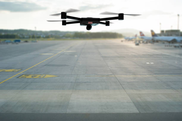 istock drone flying above the airport runway 1149092586