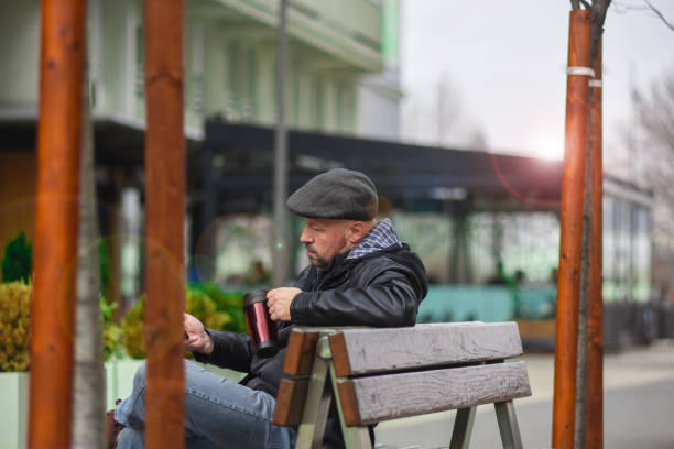 istock A middle-aged man with a mobile phone 1149097034