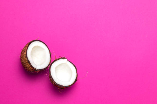 istock the halved coconut on pink background 1149101221