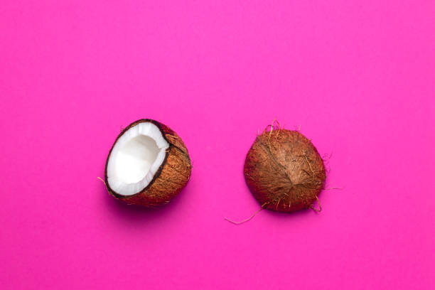 istock the halved coconut on pink background 1149101269