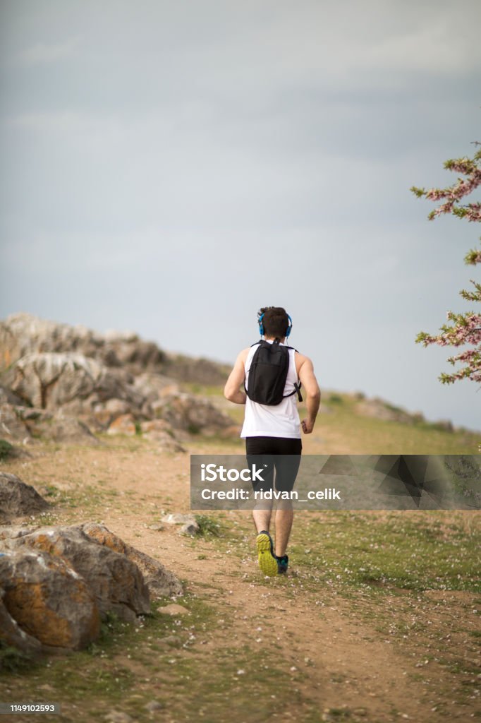 Running Man Path Man Trail Running On A Path In The Mountain Stock Photo - Download ...