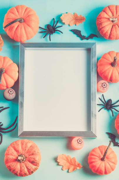 istock Halloween scene on orange background 1149106194