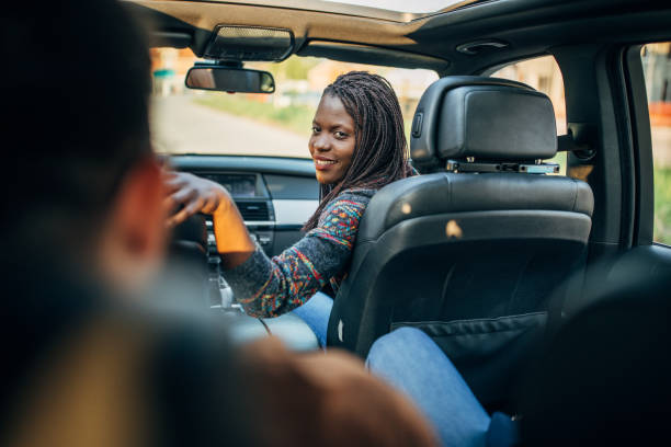 istock Friends going on vacation by a car 1149107243