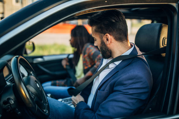 istock People putting seat belts on 1149107836
