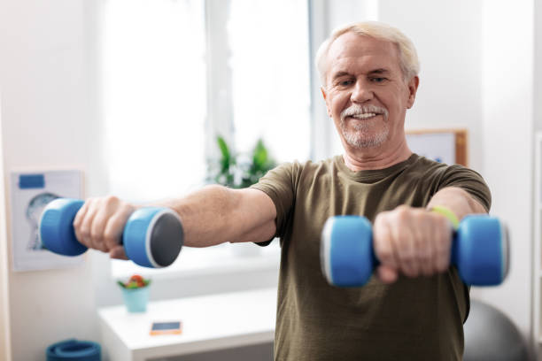 istock Pleasant cheerful man holding his hand in front of him 1149110090