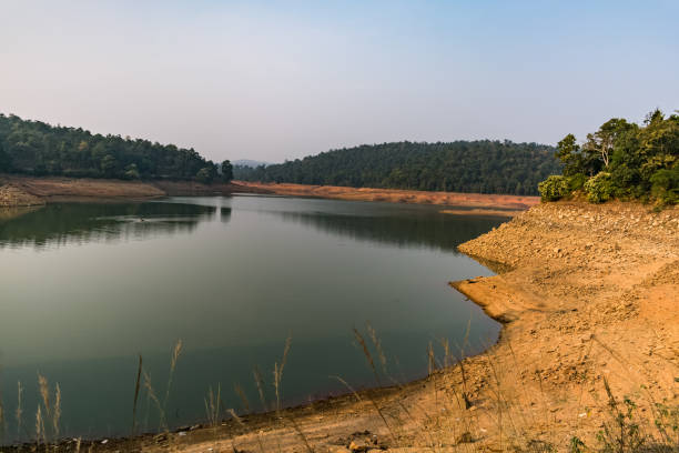 istock Indian water reservoir awesome view at evening with greenery forest back ground view. 1149110977