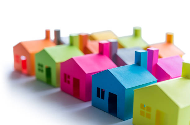 Pick your home. Group of multicolored houses on sale.