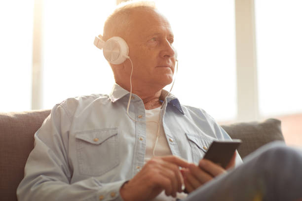 istock Senior Man  Listening to Music 1149118741