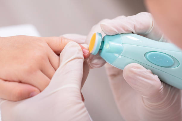 istock Mother Cutting Her Baby Finger Nail 1149119599