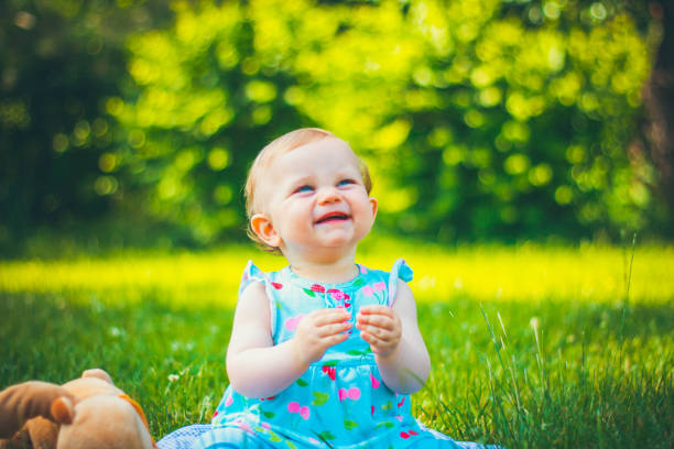 istock Little girl on grass 1149120716