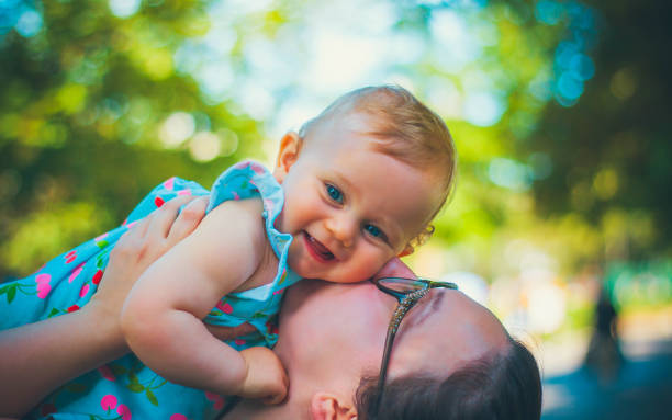 istock Mother kissing baby 1149121154