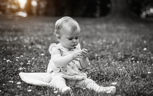 Cute one year old Argentinean girl enjoying outdoors - Buenos Aires Province - Argentina