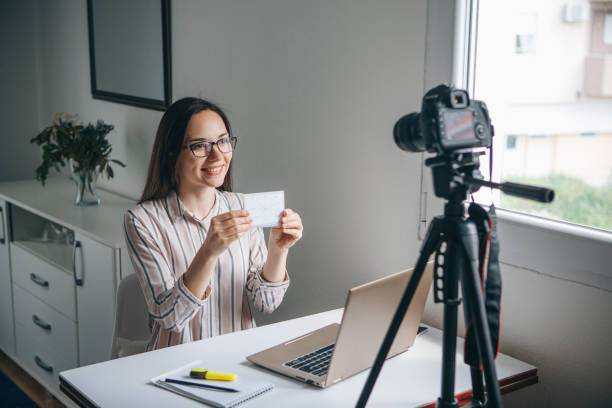 A girl is recording an instructional video.