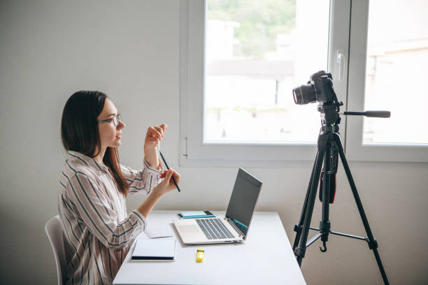 istock A girl is recording an instructional video. 1149124073
