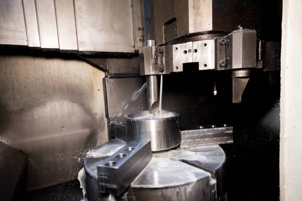 istock Close up of CNC machine at work 1149125691