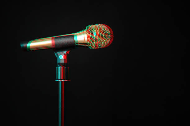 istock gold microphone on stage on a black background. Digital signal  glitch effect (rgb shift, slices). Screen error 1149127101