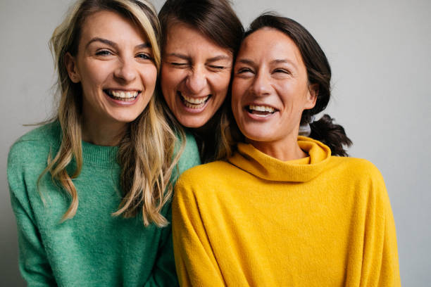 istock Portrait of smiling sisters 1149129353