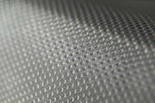 istock Abstract background of lots of grey pimples dots. Plastic surface with pimples 1149129700