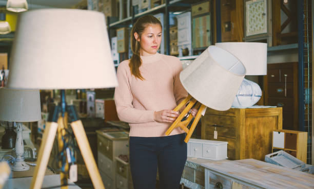 istock Female purchaser buying torchere 1149131418