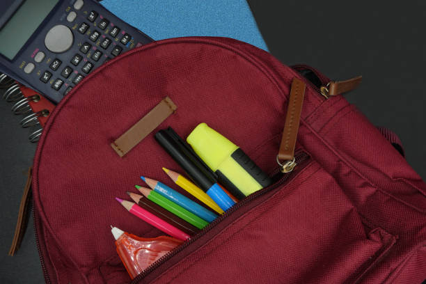 istock School supplies on blackboard background ready for your design 1149132511