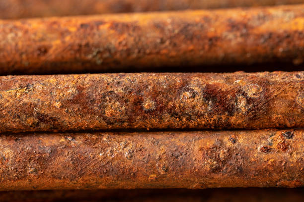 istock Scenic rusty fittings. Texture of rusty rods. Industrial abstraction. Rust closeup 1149132571