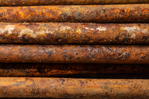 istock Scenic rusty fittings. Texture of rusty rods. Industrial abstraction. Rust closeup 1149132593