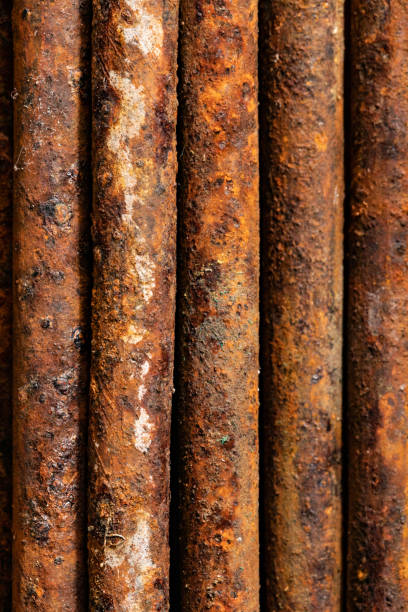 istock Scenic rusty fittings. Texture of rusty rods. Industrial abstraction. Rust closeup 1149132616