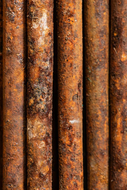 istock Scenic rusty fittings. Texture of rusty rods. Industrial abstraction. Rust closeup 1149132635