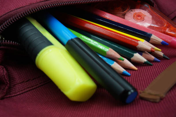 istock School supplies on blackboard background ready for your design 1149132772