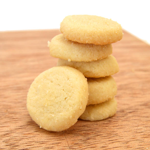 istock Freshly baked sugar cookies on wooden board 1149134024