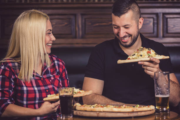 istock Young Happy Couple in Cafe 1149134517
