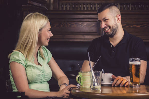 istock Young Happy Couple in Cafe 1149134530