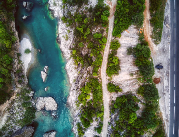istock Road along river Moraca aerial view 1149134558