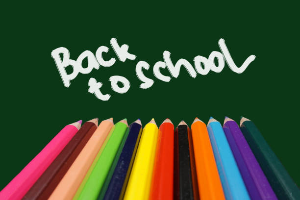 istock School supplies on blackboard background ready for your design 1149135203